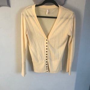 Soft yellow snap down cardigan size L